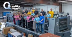 Staff gather for a group photo at Spectrum Custom Packaging, Inc.