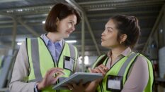 Engineering women using a tablet and having a discussion at a warehouse Engineering women using a tablet and having a discussion at a warehouse.